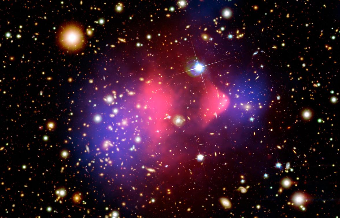 Two galaxies pass in a bullet cluster.